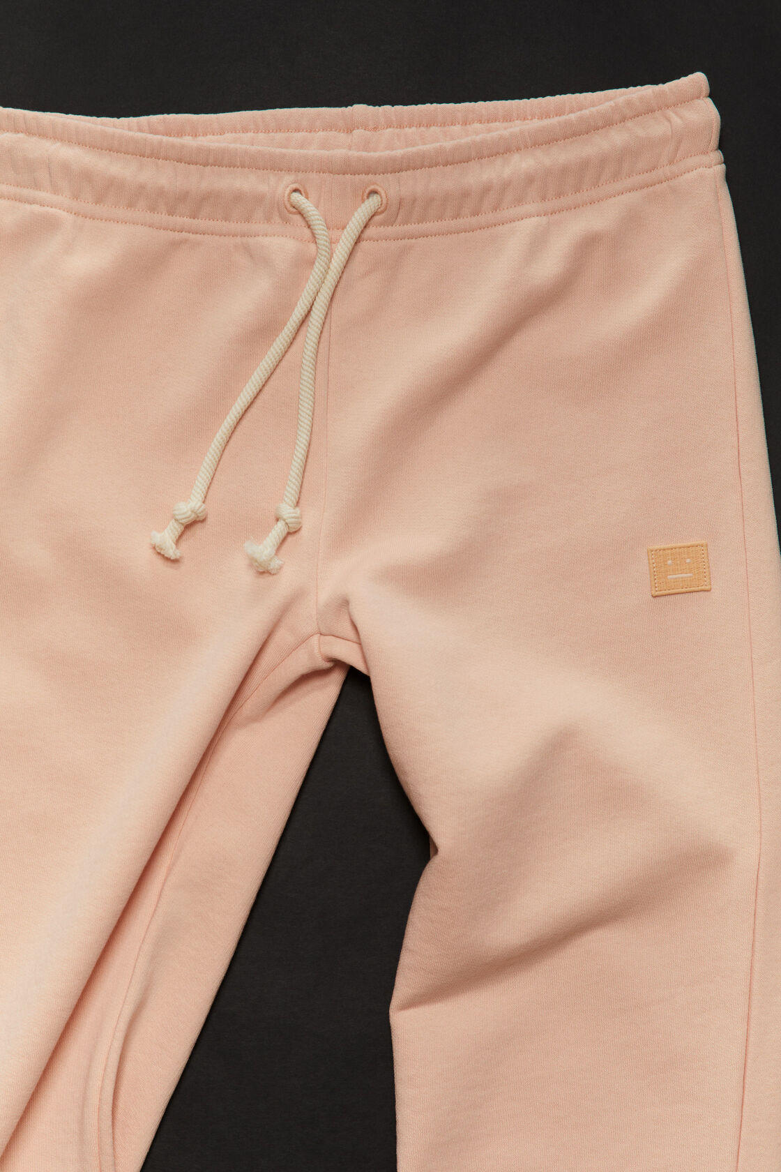 Acne Studios Face Logo Sweatpants (2 Colors)